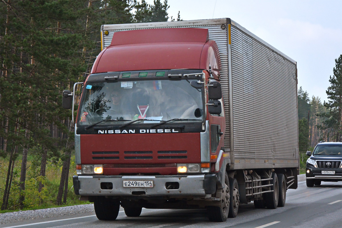 Новосибирская область, № Е 249 ЕН 154 — Nissan Diesel (общая модель)