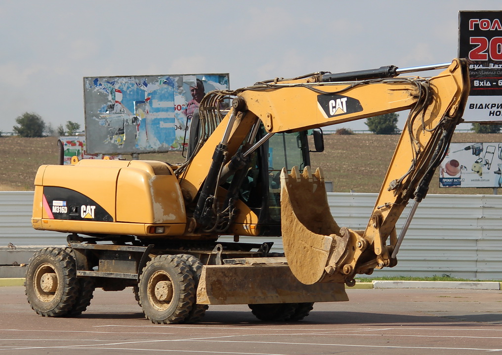 Одесская область, № (UA16) Б/Н СТ 0055 — Caterpillar M316; Одесская область — Спецтехника с нечитаемыми (неизвестными) номерами